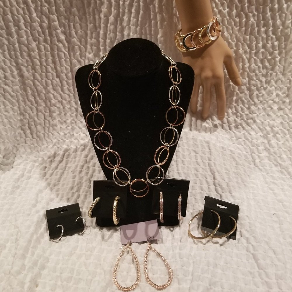 Tri Metal necklace 5 pair of earrings and bracelet.